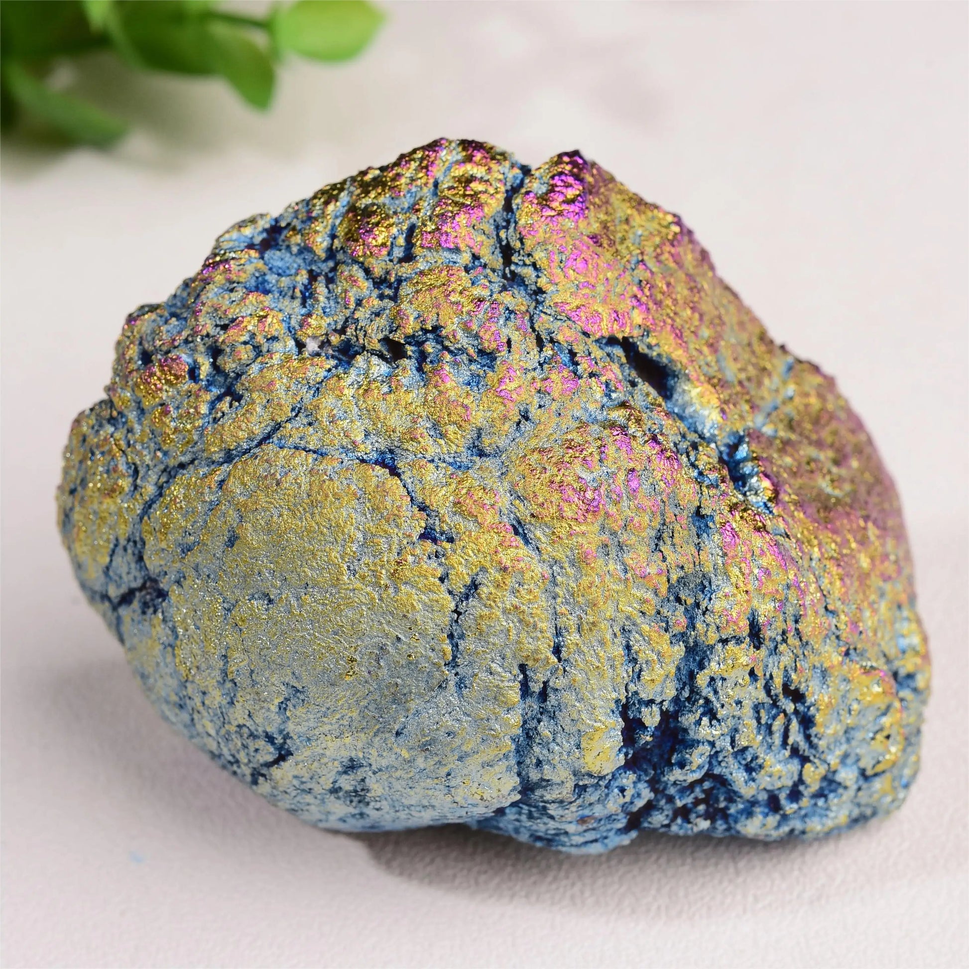Gold and rainbow aura geode exterior