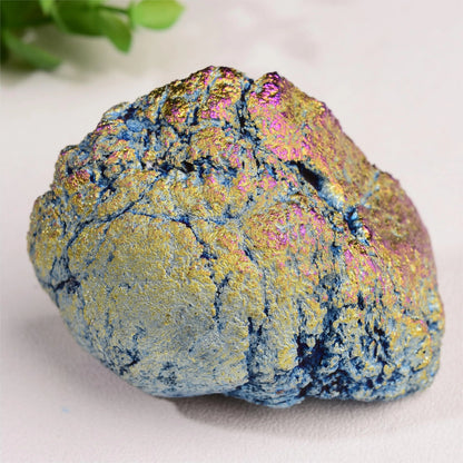 Gold and rainbow aura geode exterior