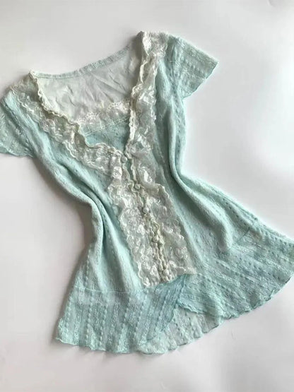 Sheer mint lace short sleeve top with plunging V neckline
