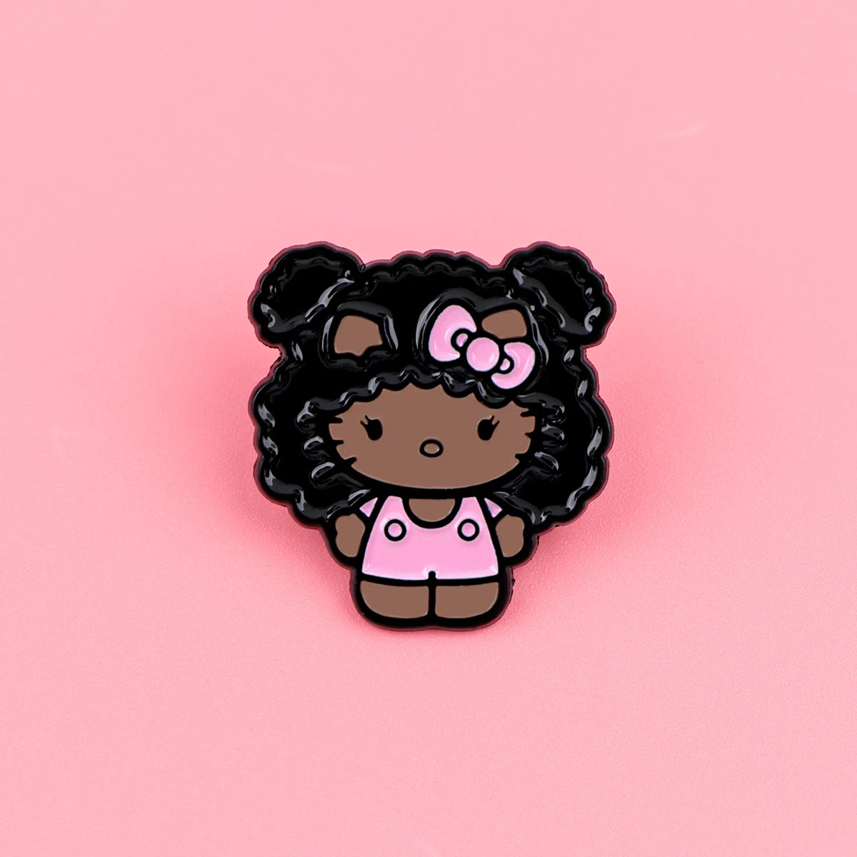Enamel pin on pink background