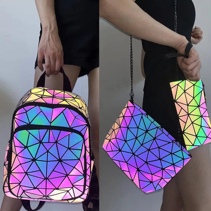 Model carrying the Prism Riot backpack and clutch
