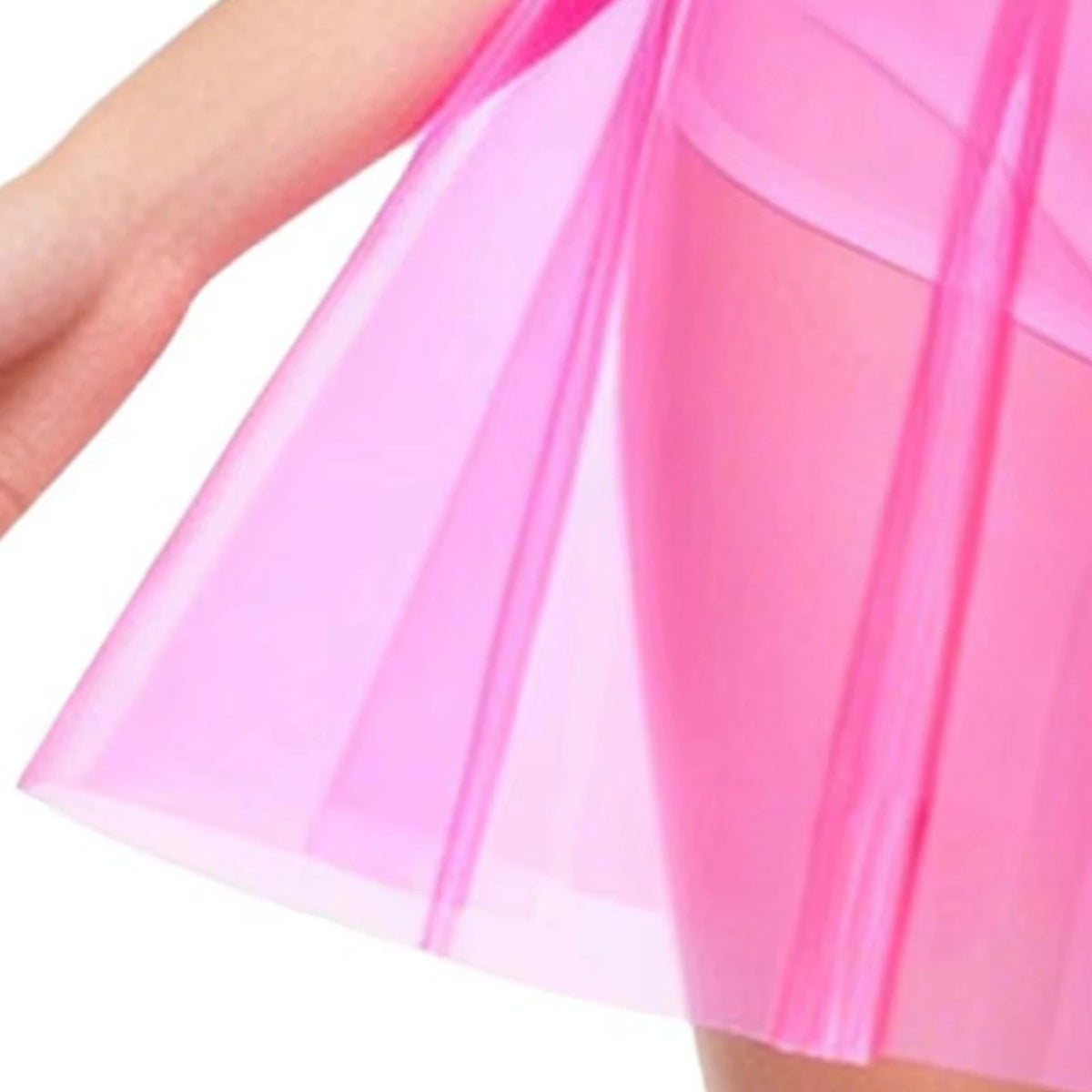Pleated vinyl skirt in motion