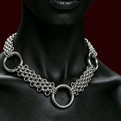 Triple-row chainmail choker with three O-rings worn at the throat