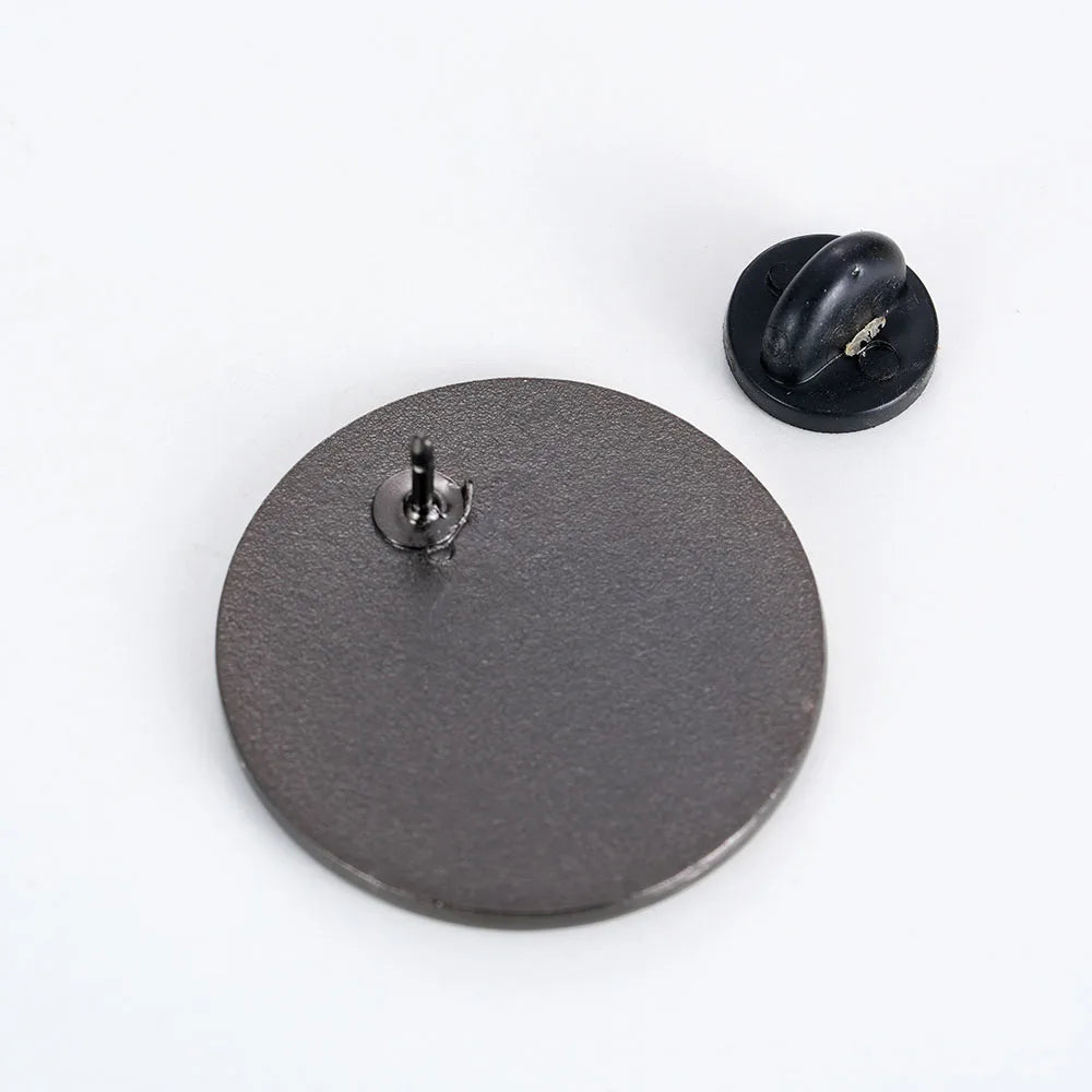 Back of the pin showing pin post and rubber clutch