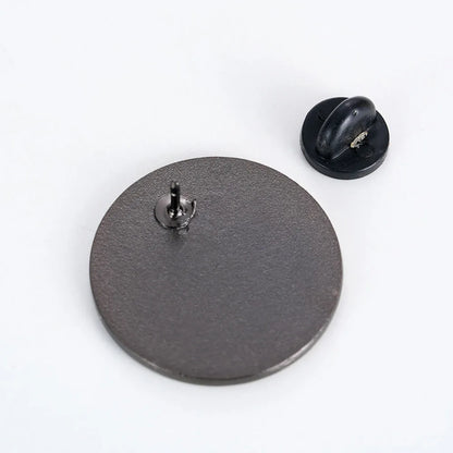 Back of the pin showing pin post and rubber clutch