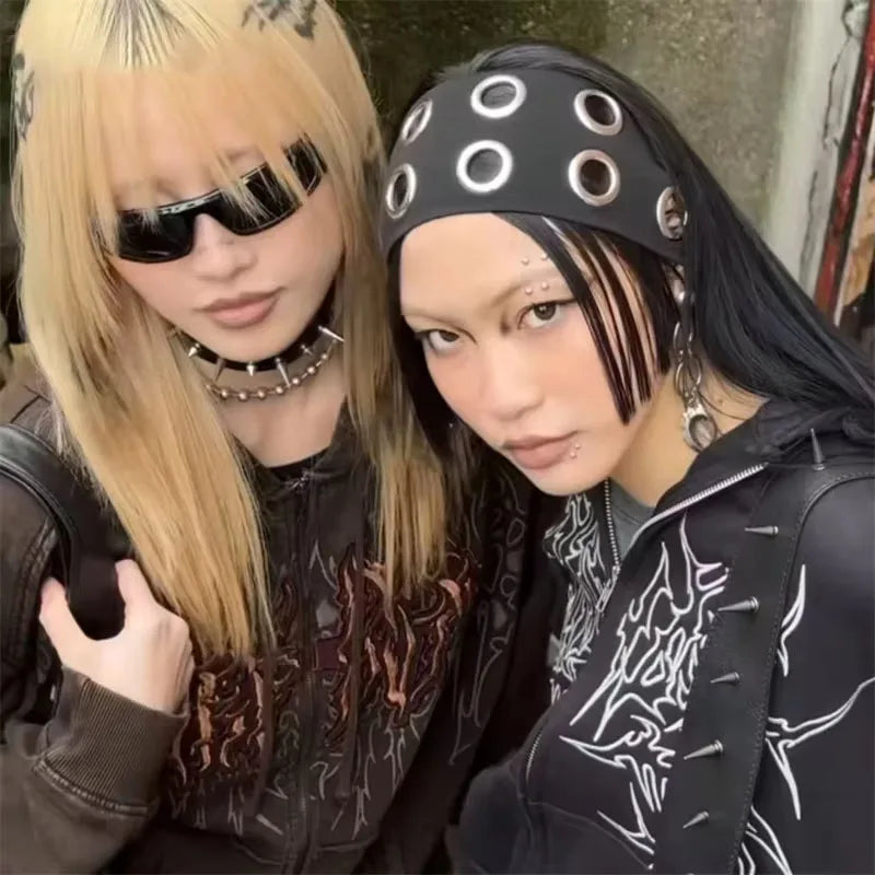 Two models in black eyelet headbands with punk streetwear
