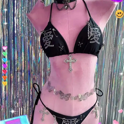 Black rhinestone bikini set with crystal cross charms styled on a mannequin
