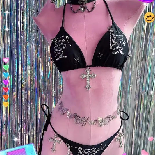 Black rhinestone bikini set with crystal cross charms styled on a mannequin