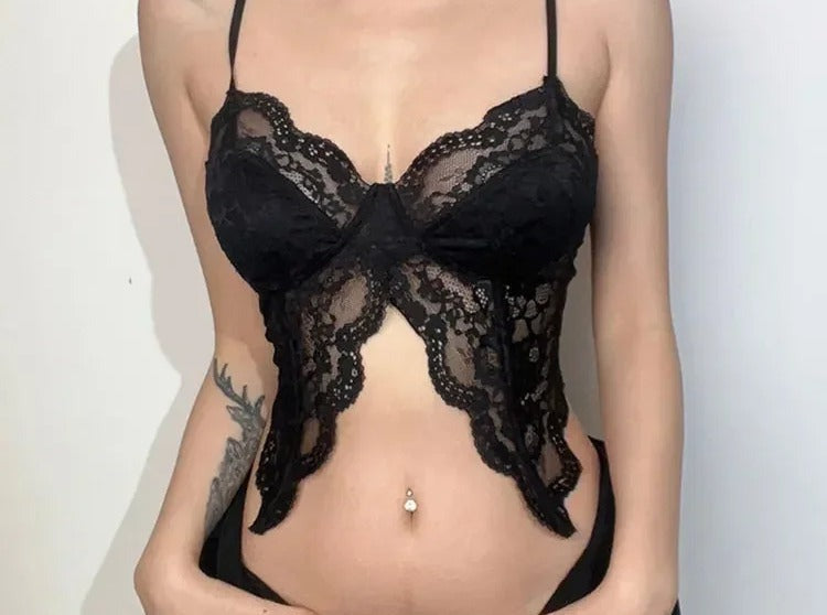 Sheer black lace bustier cut in a wing shape with scalloped edges