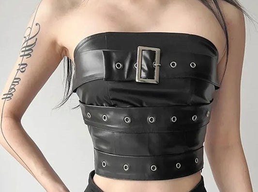 Black faux leather tube top with buckle and grommet studded belt straps