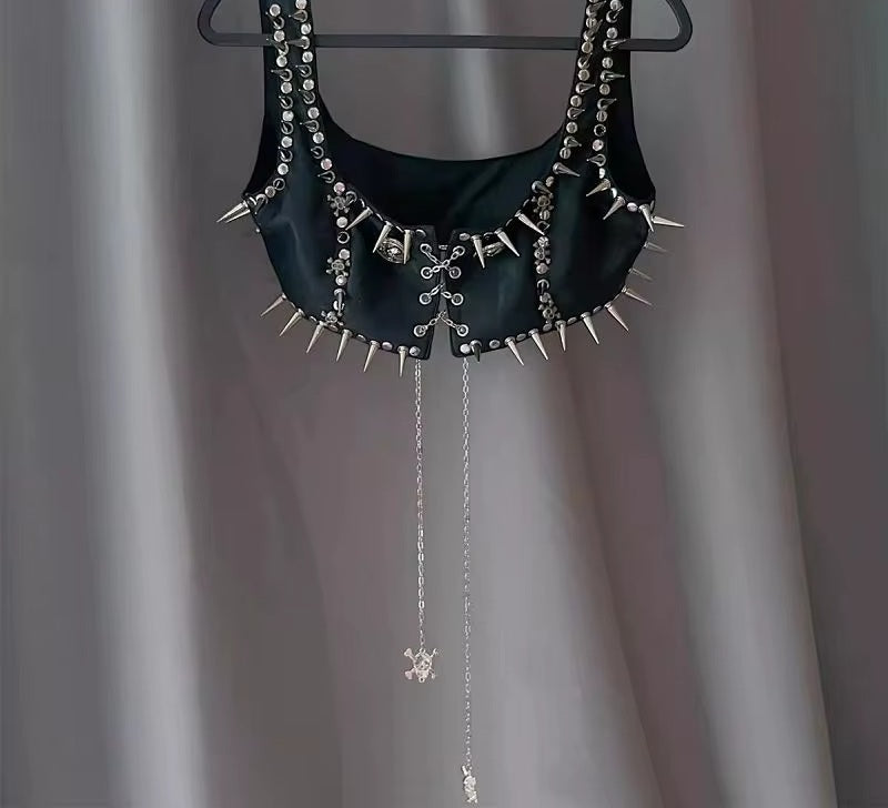Spiked chain harness crop top on a hanger