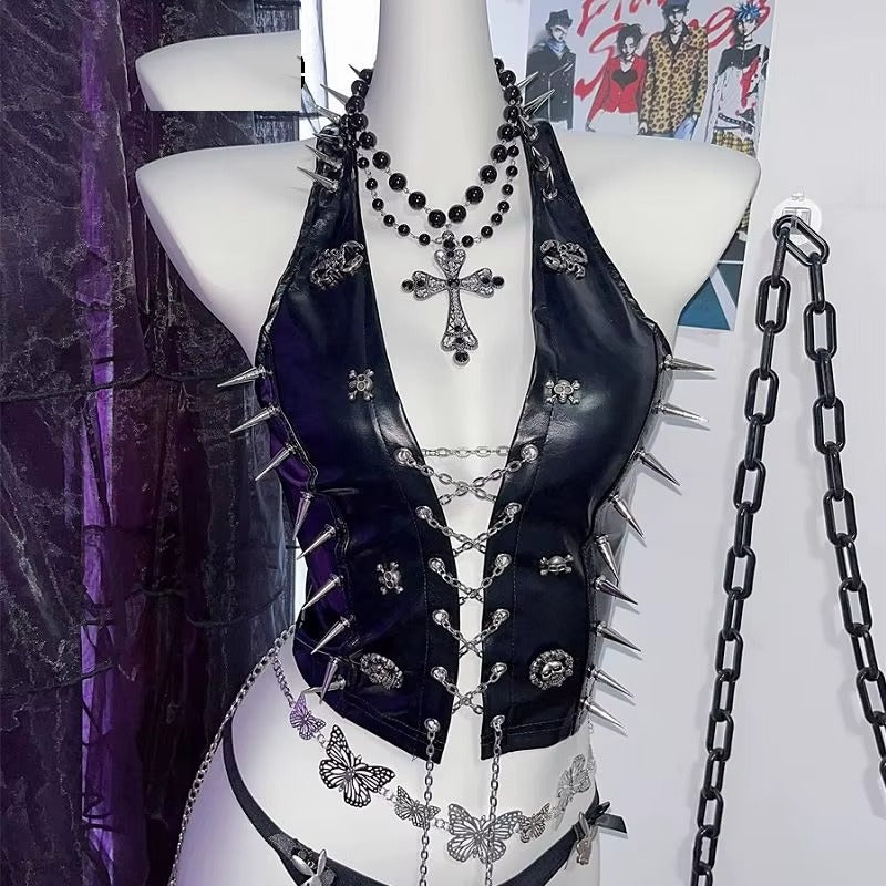 Detail of the rivets, cross charms and spike trim
