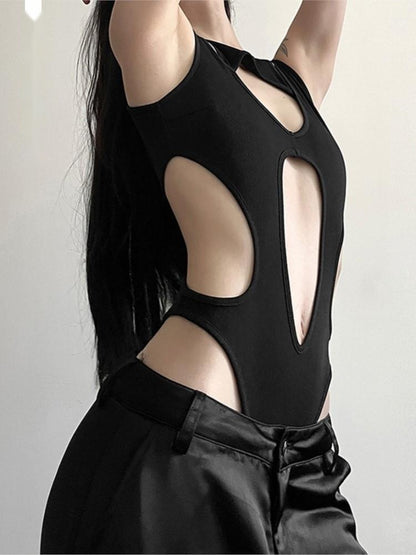 Hollow Point cutout bodysuit styled with satin trousers