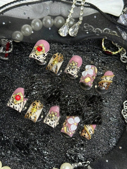 Champagne Safari press-on nails, leopard and zebra print detail with gold charms