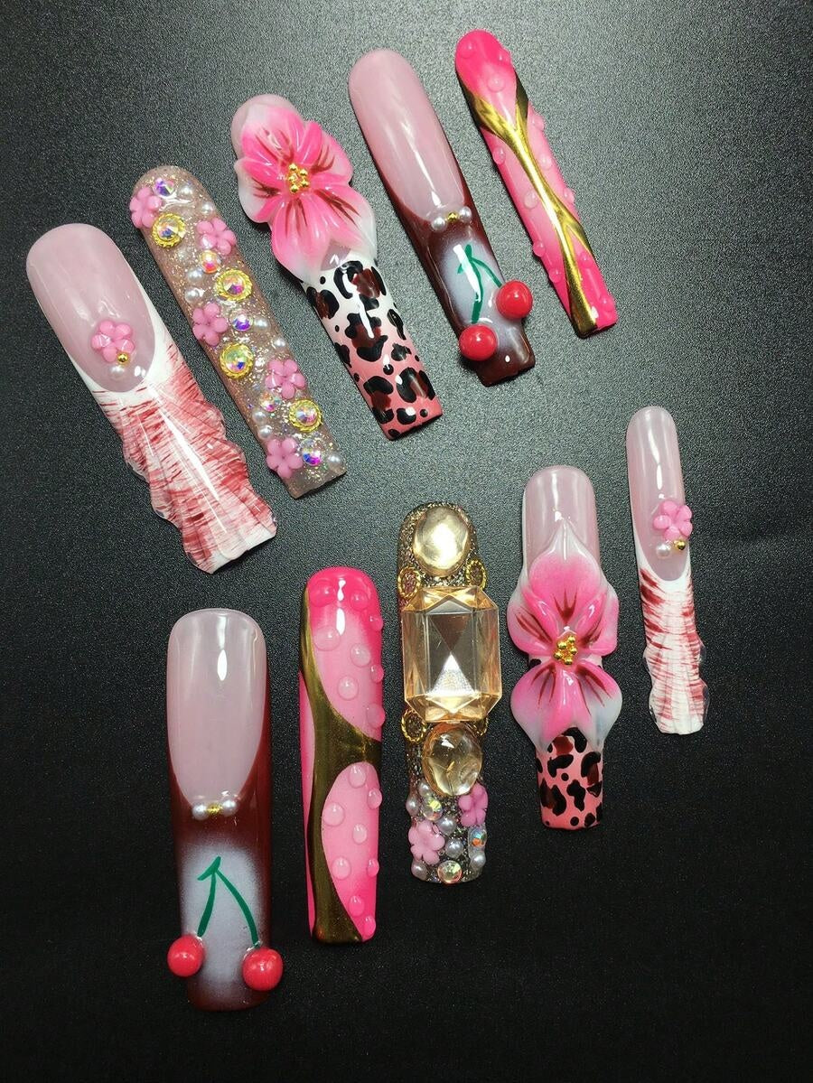 Pink 3D lily, pearl and crystal detail on extra long coffin nails