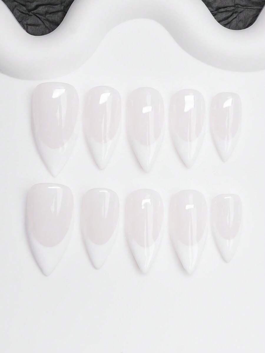 Almond press-on nails in glossy milky pink with white French tips
