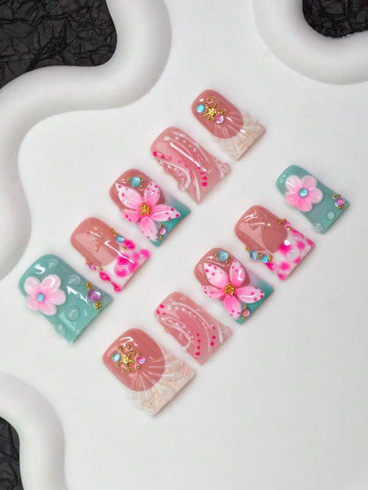 Short duck flare press-on nails in mint and blush with 3D flowers and starfish charms