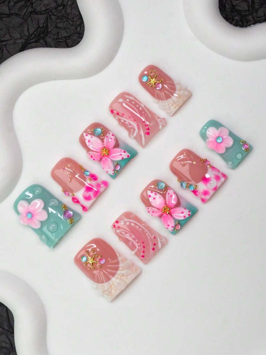 Short duck flare press-on nails in mint and blush with 3D flowers and starfish charms