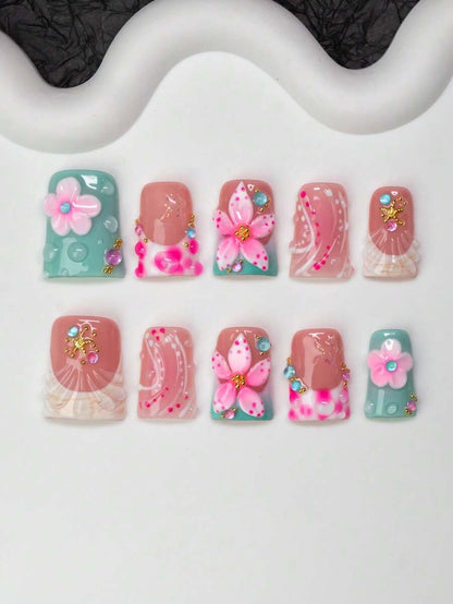 Full set of tidepool flower duck press-on nails laid out by finger