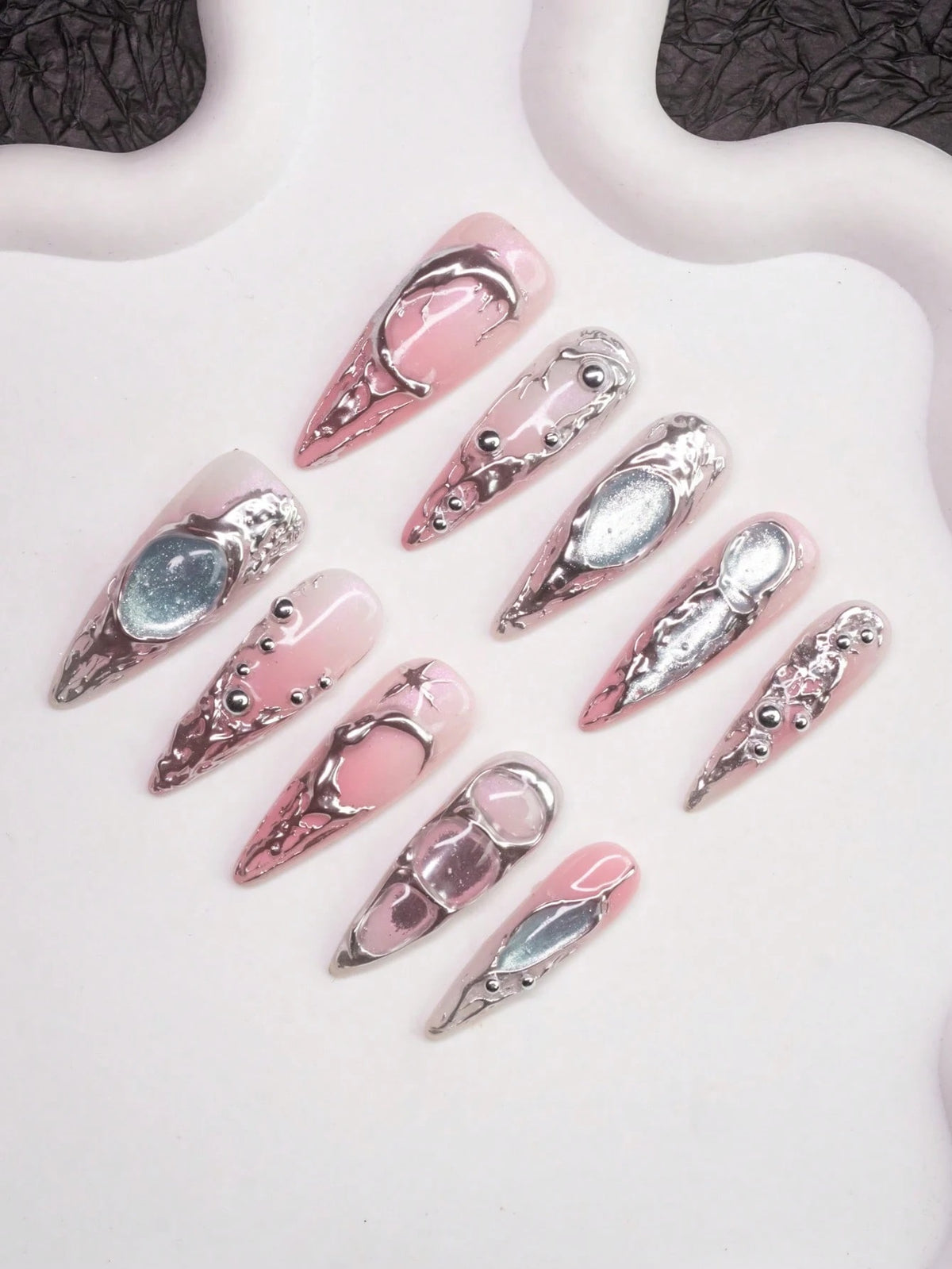 Chrome Rose press-on nails in blush pink and liquid silver