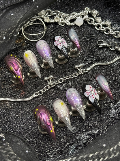 Dark floral stiletto press-on nail set with neon star accents