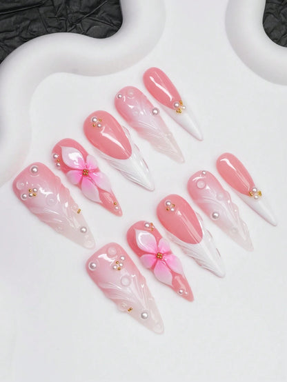 Blush Petal long stiletto press on nails, angled view