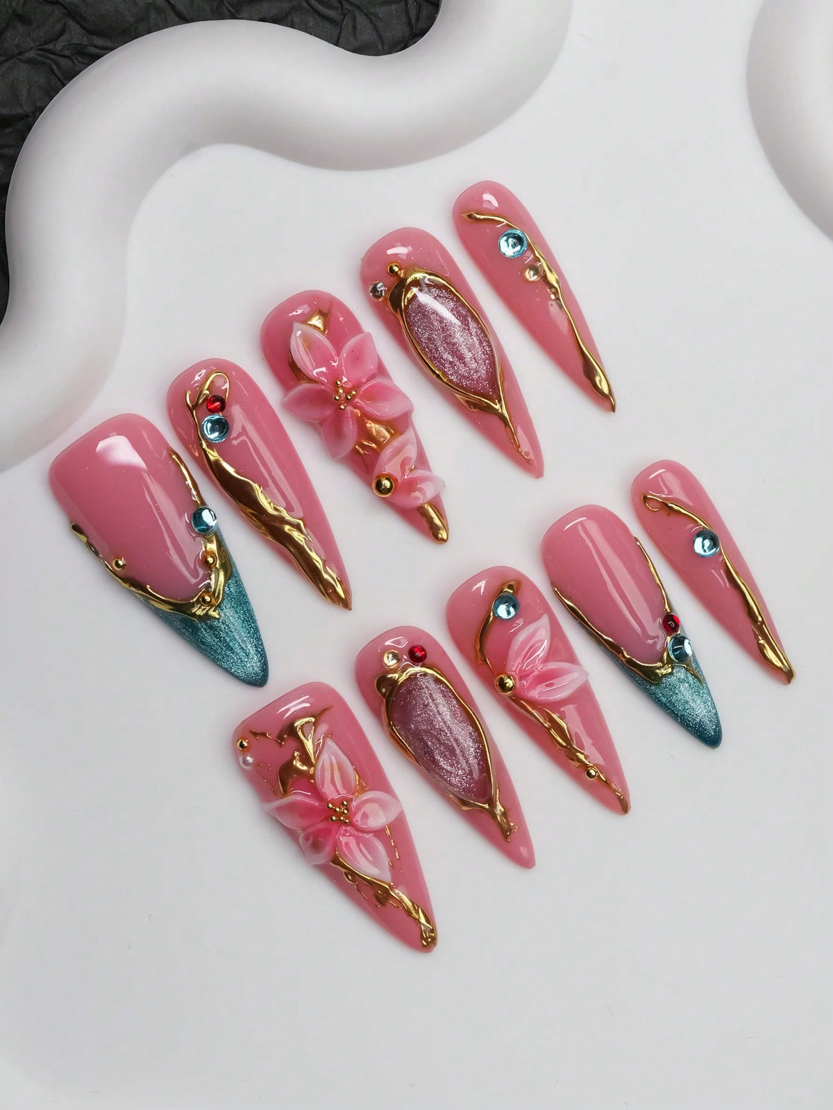 Gilded Lily long stiletto press on nails, pink gel with gold and teal cat-eye tips