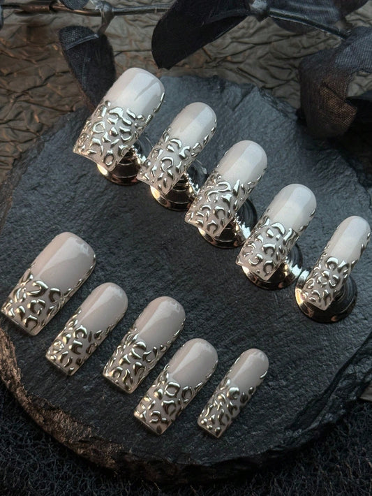 Liquid Leopard medium square press on nails in greige with silver relief