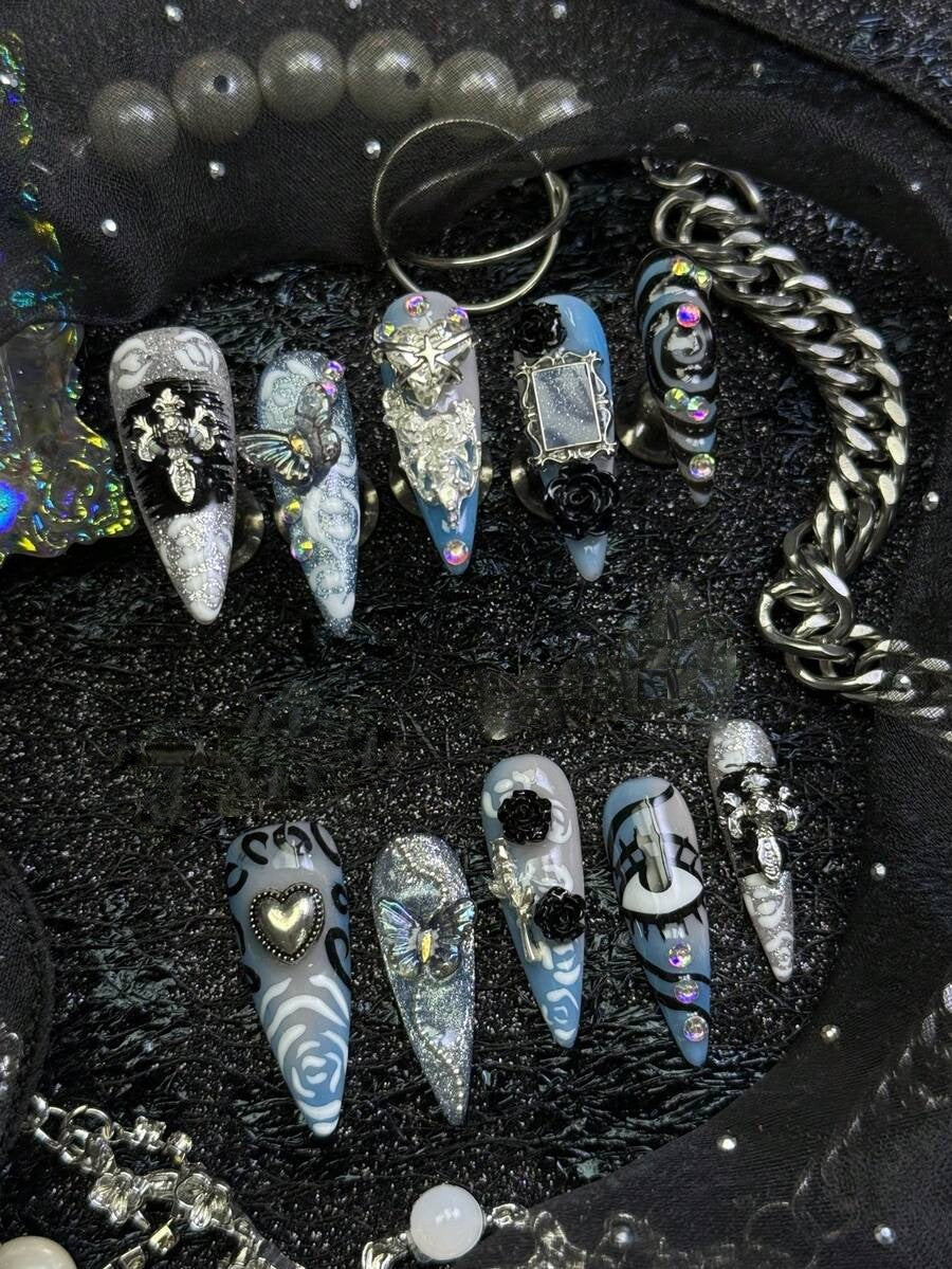 Frostbite Rose long stiletto press on nails in icy blue and silver with 3D roses and crosses