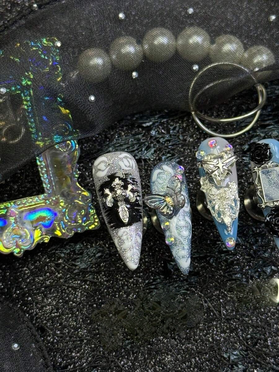 Frostbite Rose stiletto nails with 3D charms