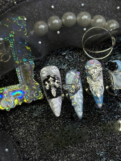 Frostbite Rose stiletto nails with 3D charms