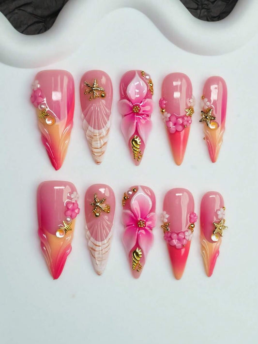 Sunset Shell long almond press on nails in pink and coral with 3D flowers and gold starfish
