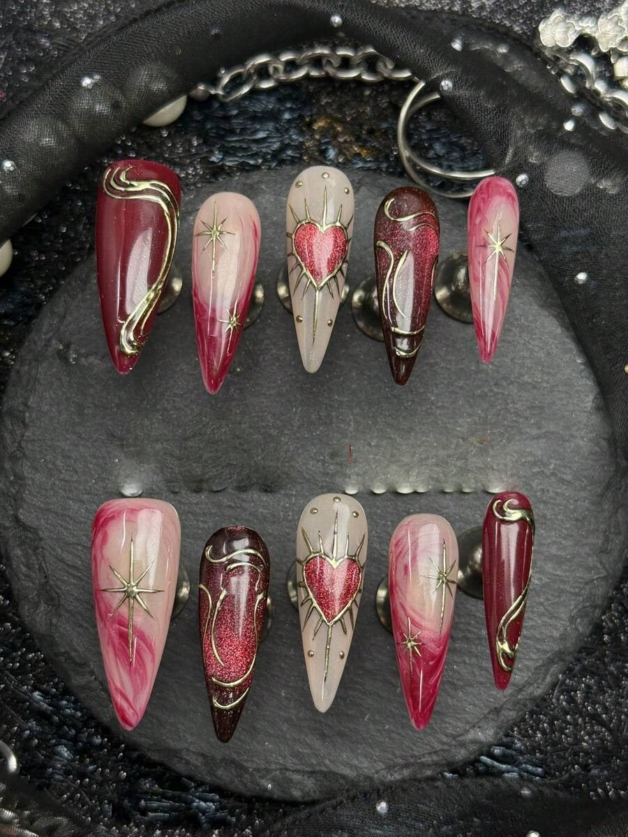 Bleeding Heart long stiletto press on nails in wine red and blush with gold heart linework