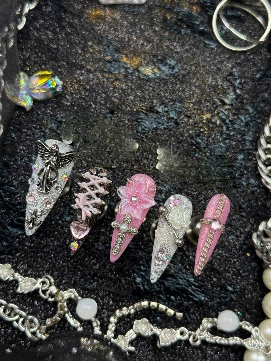 Sweet Sinner stiletto nails with silver chains and crystals