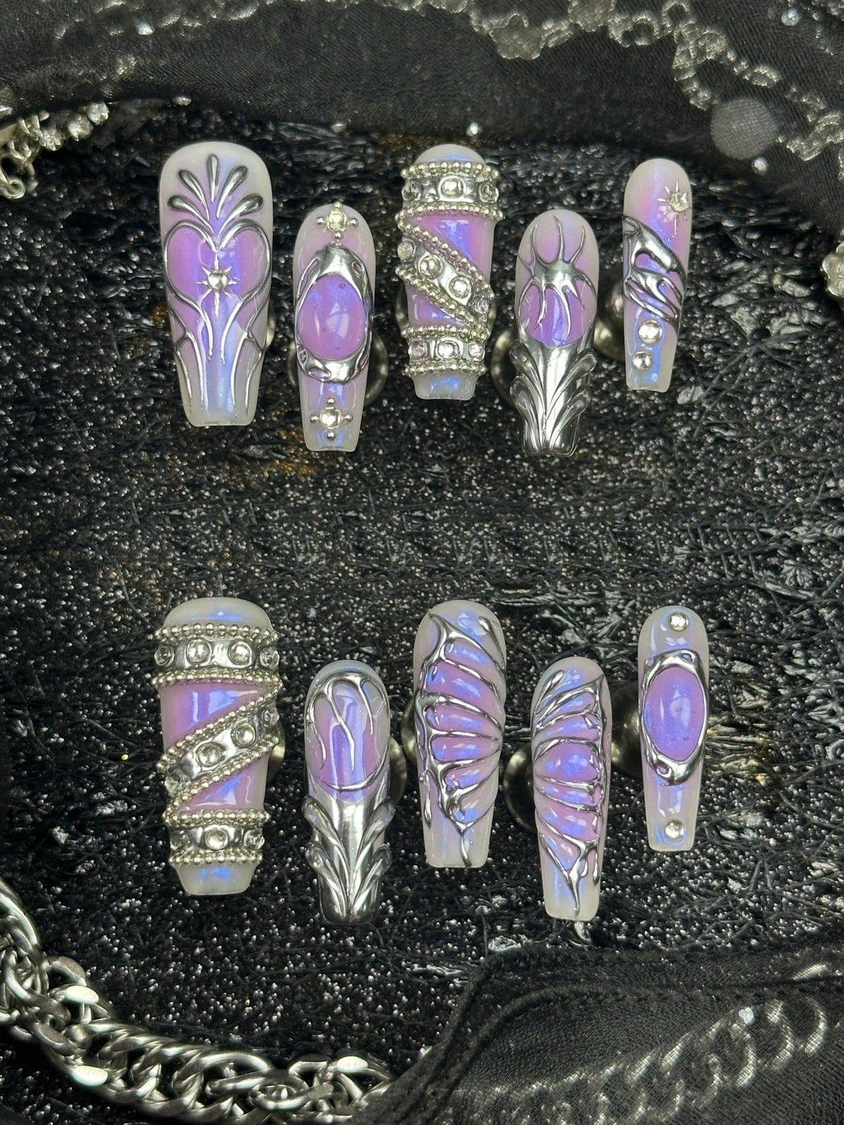 Violet Hour press on nails with sculpted silver chrome swirls