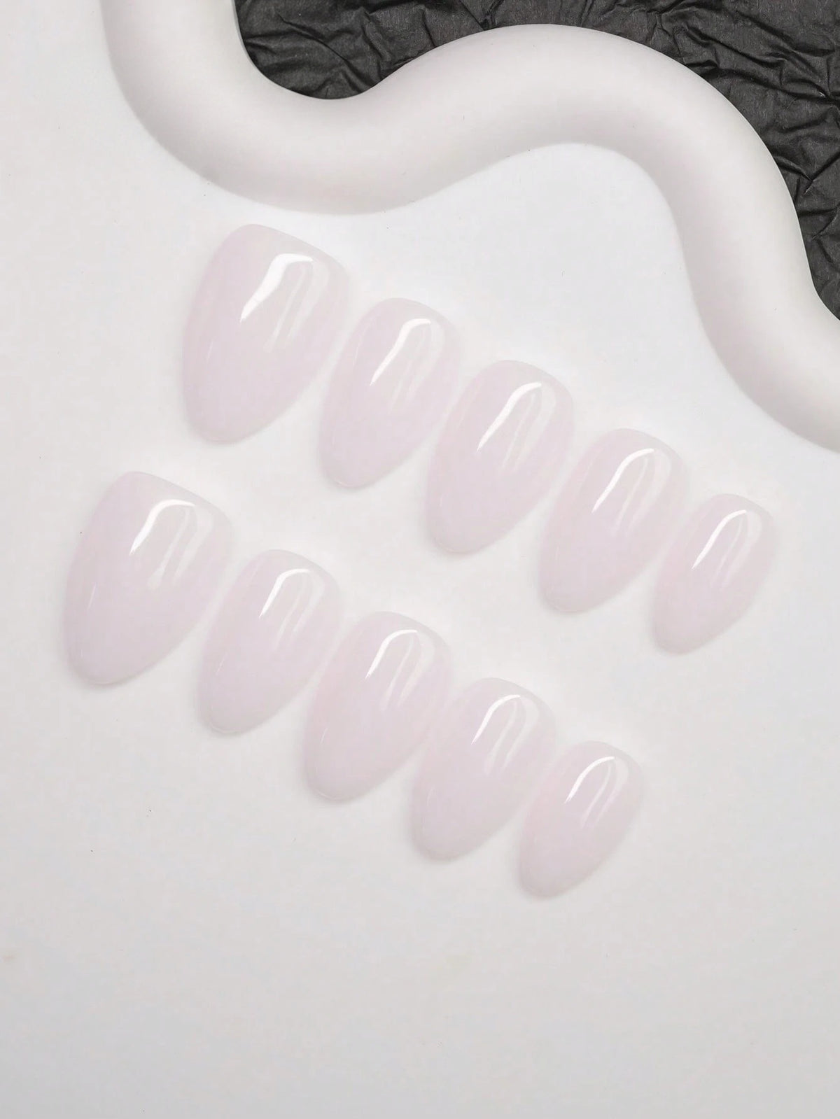 Milk Bath almond press on nails glossy finish close view