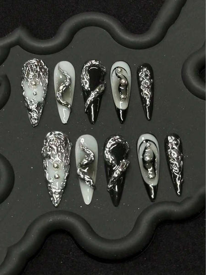 Mercury Venom long stiletto press on nails in silver foil, black and white