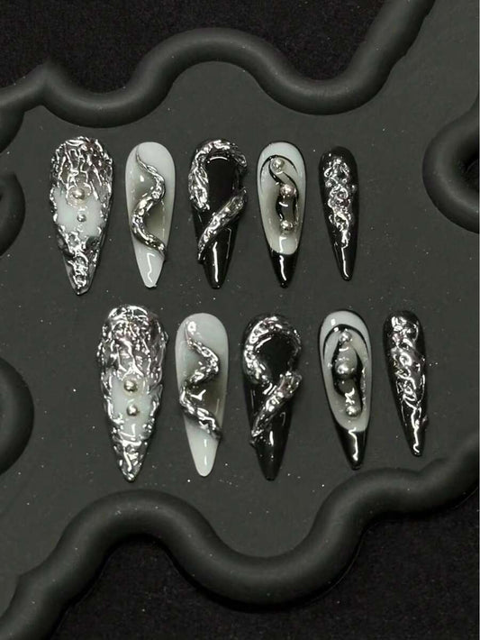 Mercury Venom long stiletto press on nails in silver foil, black and white