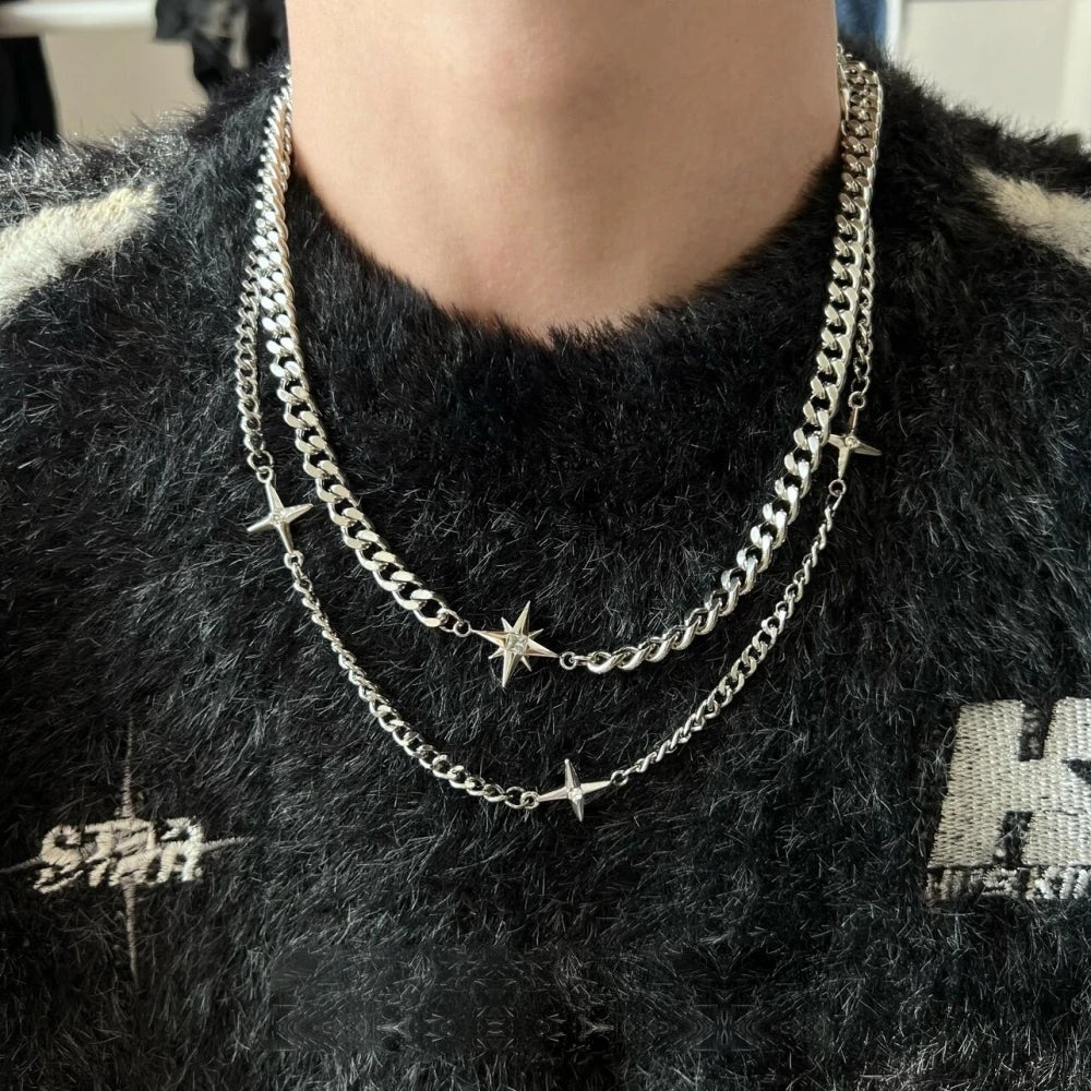 Double Drop layered four-point star chain necklace worn on model